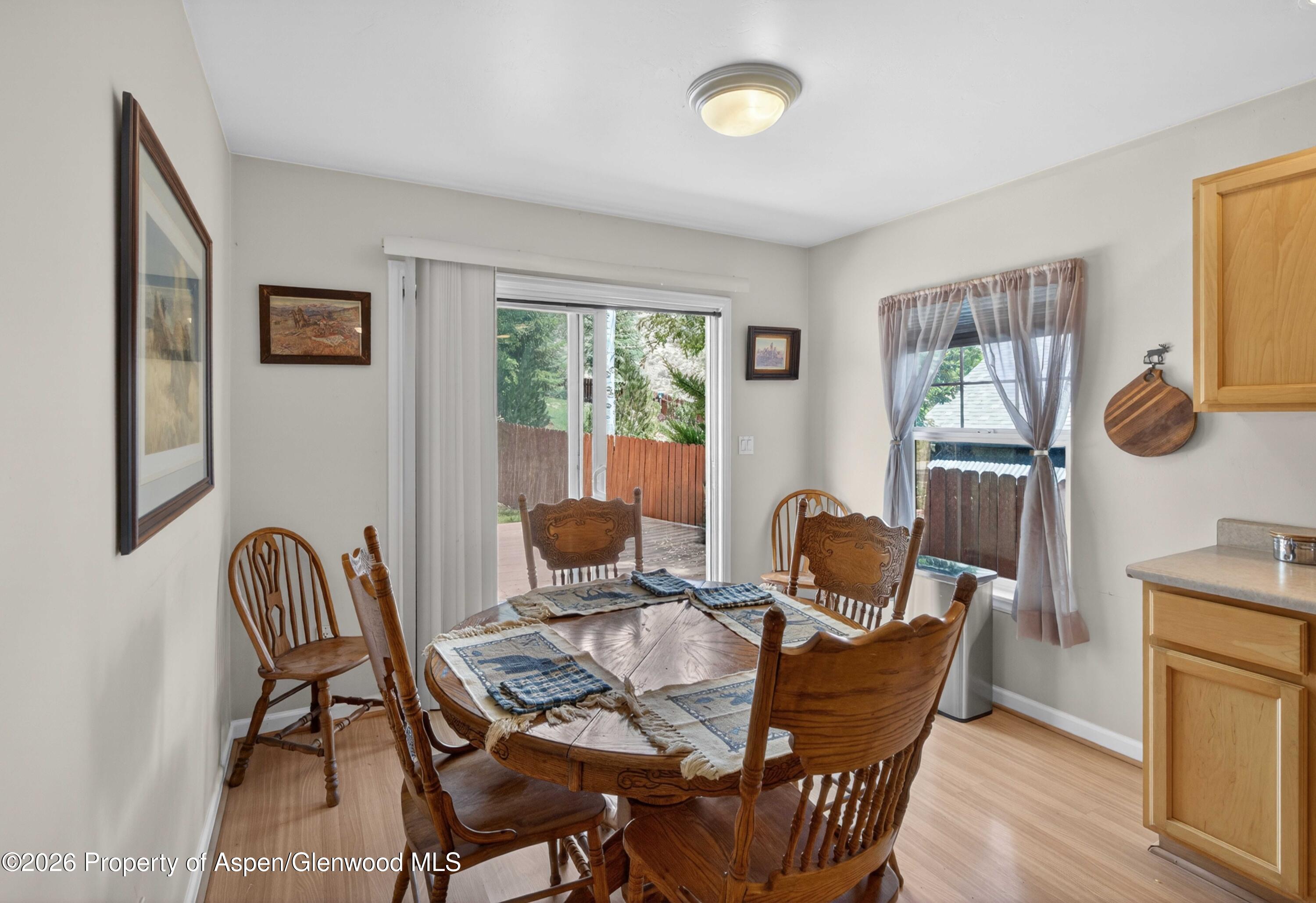 608 Lariat Loop New Castle, CO 81647 - Photo 11 of 32 a dining room with furniture and window
