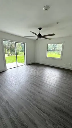 a view of a park and basketball court
