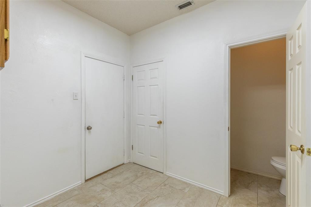 1026 Reeves Street Abilene, TX 79602 - Photo 37 of 38 Laundry room with the 1/2 bath off the garage.