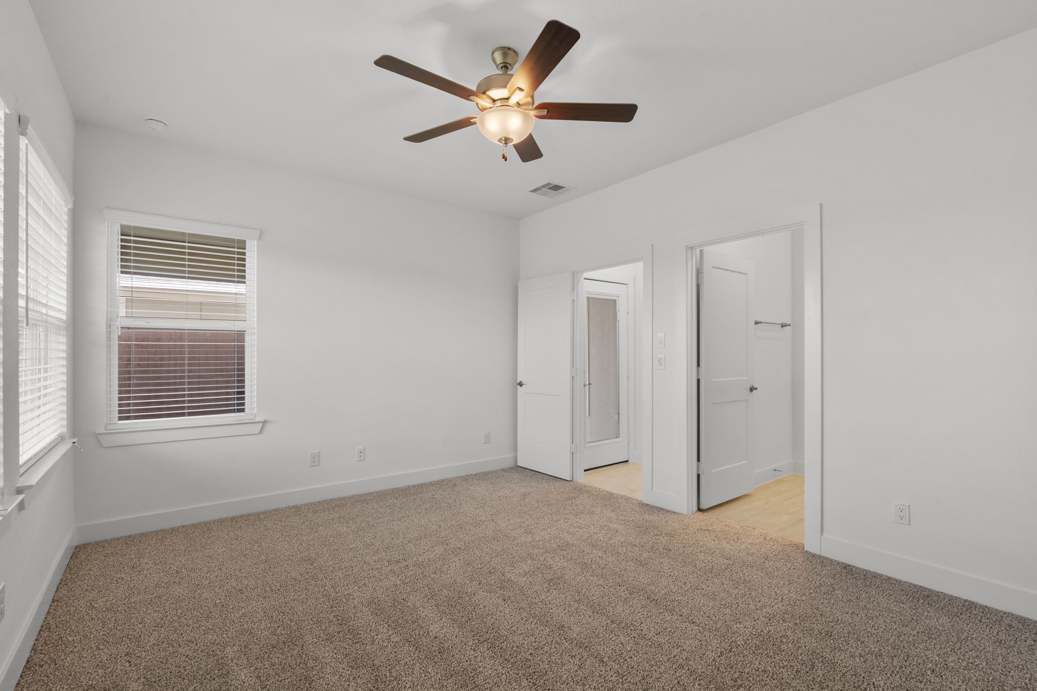 5247 Celestial Court Iowa Colony, TX 77583 - Photo 21 of 39 a view of an empty room with a window