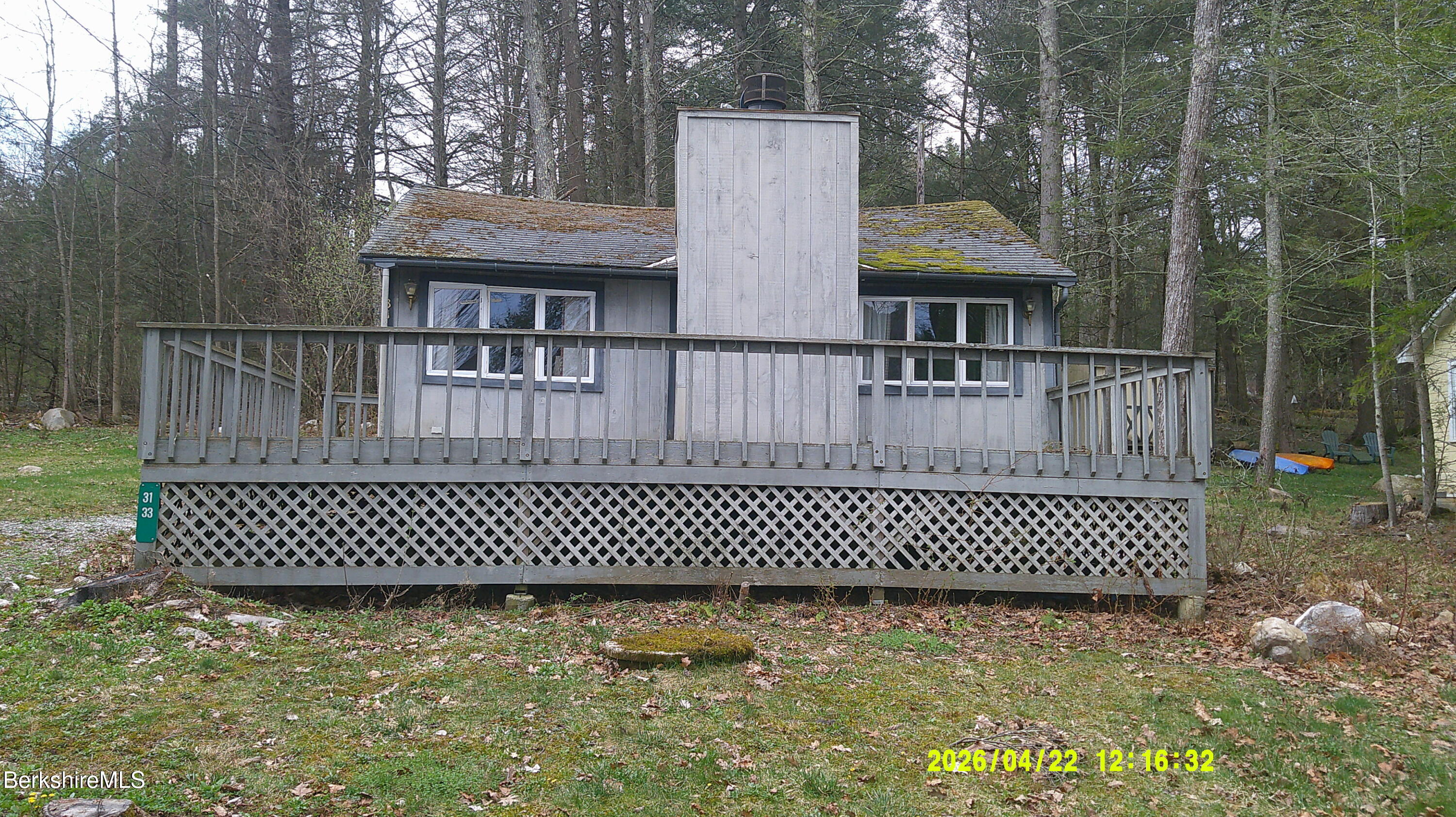 33 Pine Road New Marlborough, MA 01230 - Photo 4 of 11 a view of a brick house with a large trees