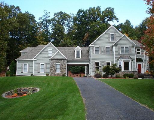 84 Meadow Road West Trumbull, CT 06611 - Photo 1 of 1 a front view of a house with a yard