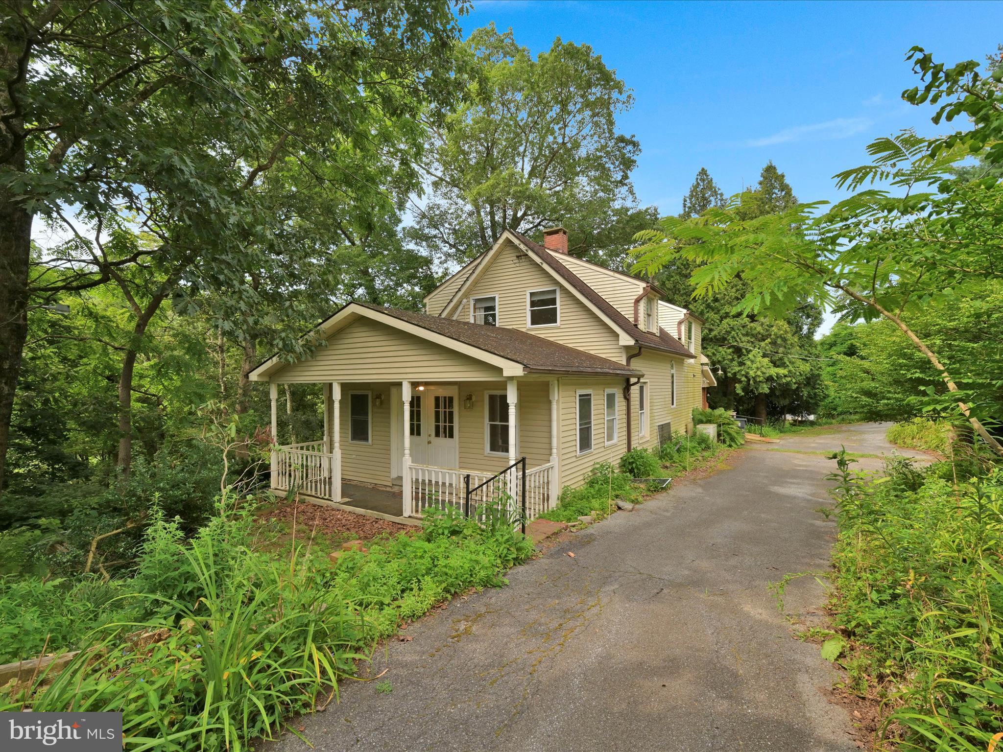 21 Blue Rocks Road Lenhartsville, PA 19534 - Photo 13 of 48 a front view of a house with a garden