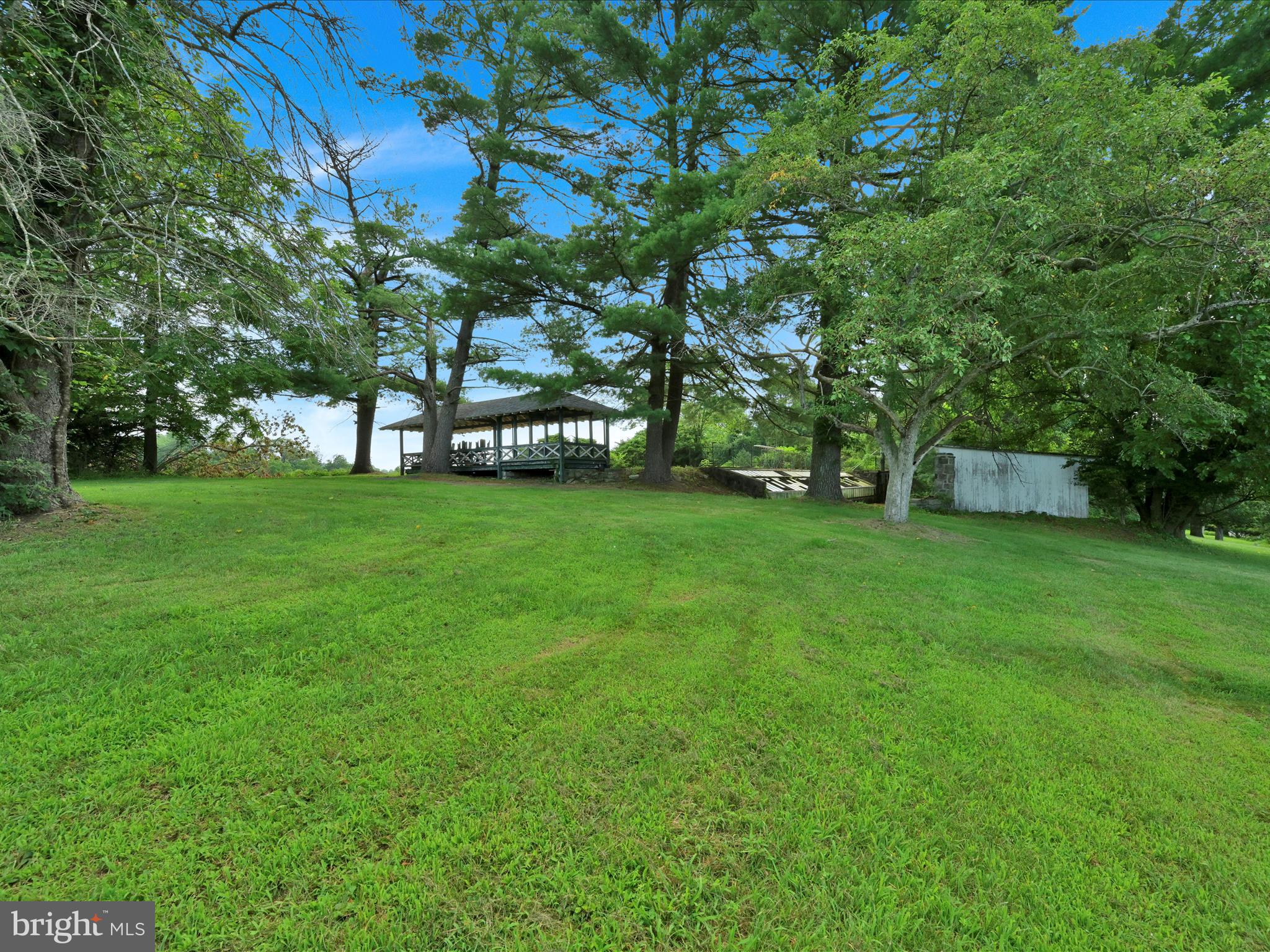 21 Blue Rocks Road Lenhartsville, PA 19534 - Photo 37 of 48 a view of a field of grass and trees