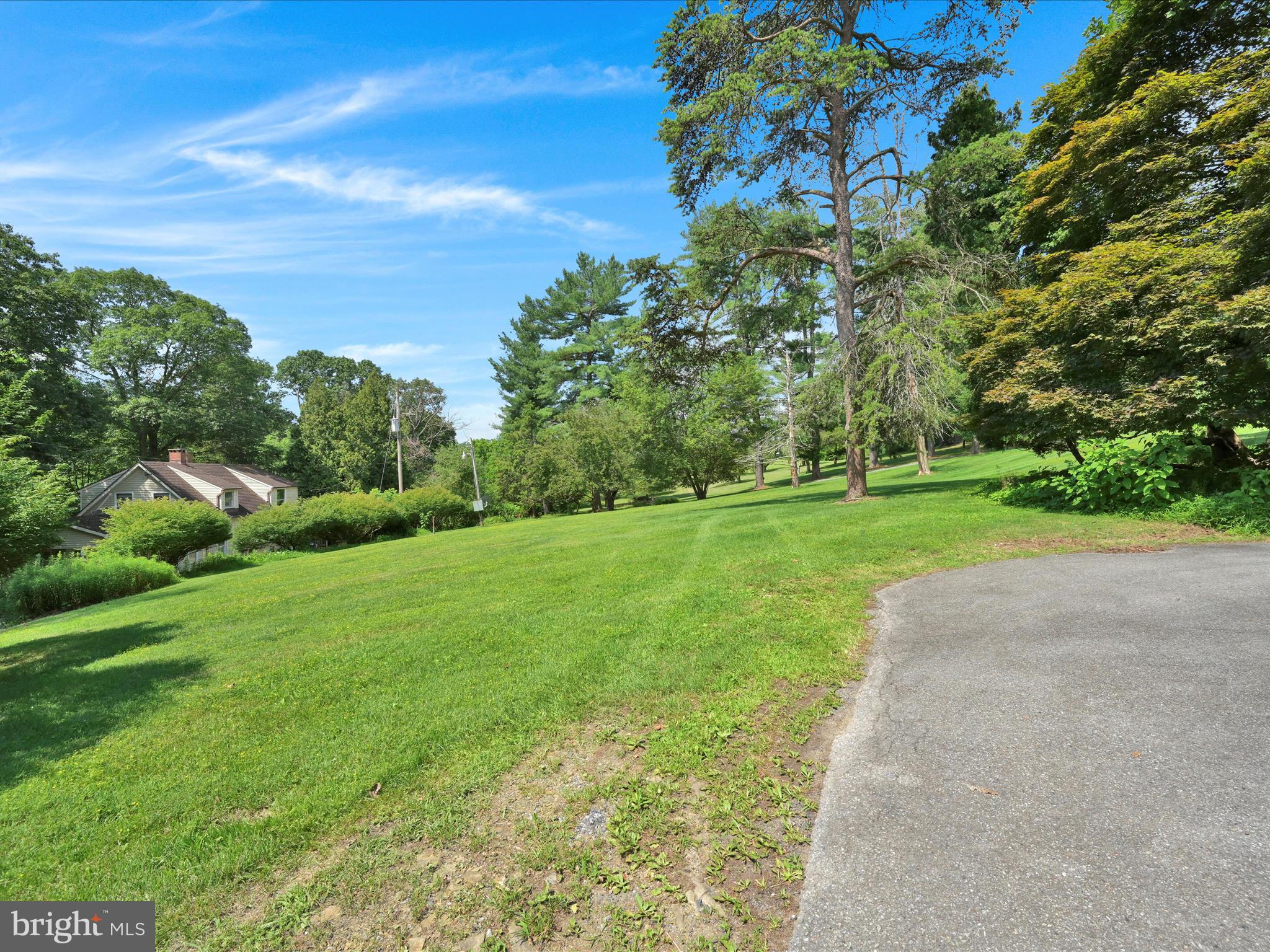 21 Blue Rocks Road Lenhartsville, PA 19534 - Photo 42 of 48 a view of a grassy field with trees