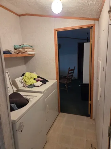 a kitchen view with a sink