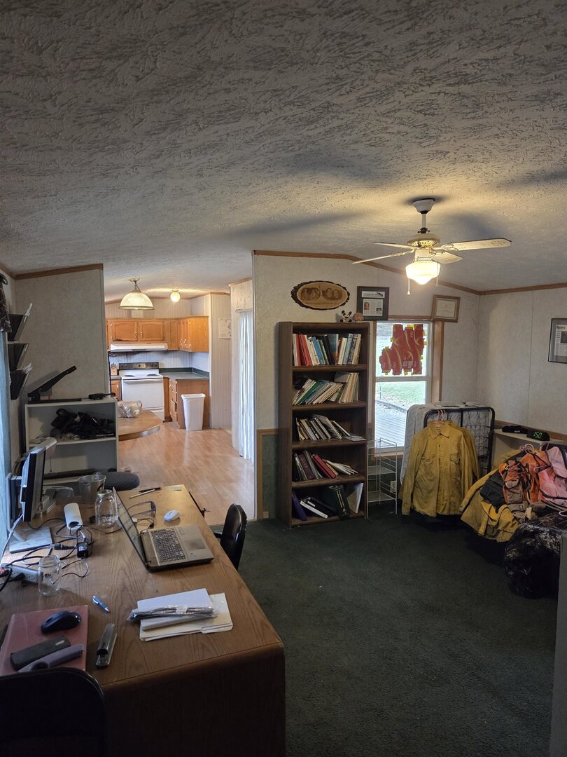 2220 Spanish Bluff Road Anna, IL 62906 - Photo 19 of 26 a bedroom with furniture and a gym machine