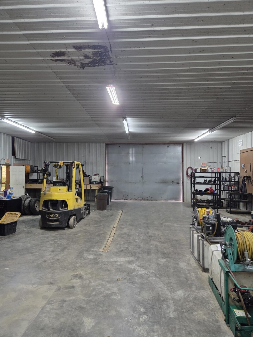 2220 Spanish Bluff Road Anna, IL 62906 - Photo 8 of 26 a view of parking garage with cars