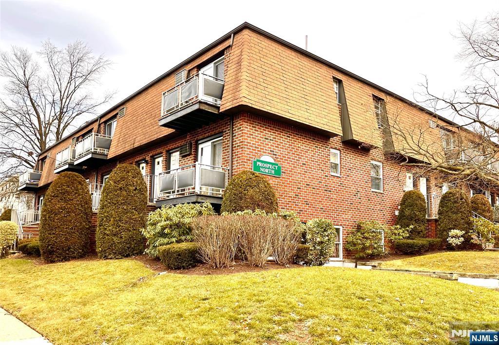 322 Anderson Street, Unit 318C Hackensack, NJ 07601 - Photo 1 of 1 a view of a house with snow on the road