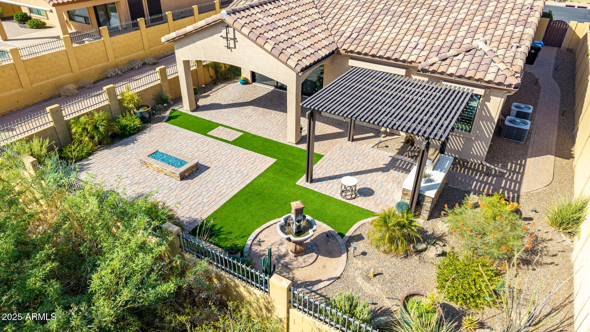 a view of a backyard with sitting area