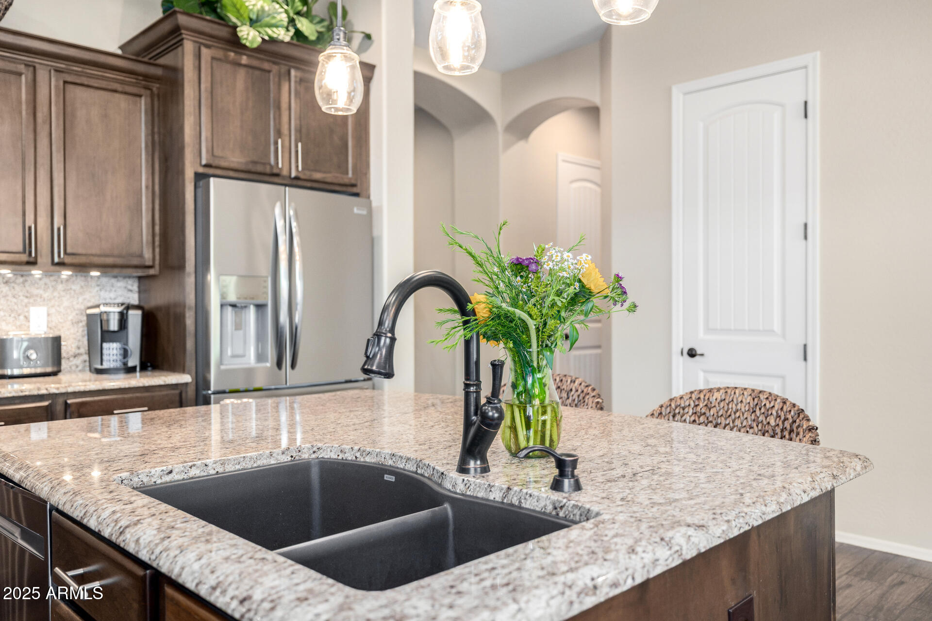 1822 North Waverly Mesa, AZ 85207 - Photo 37 of 91 a kitchen with stainless steel appliances granite countertop a sink a counter space and a refrigerator