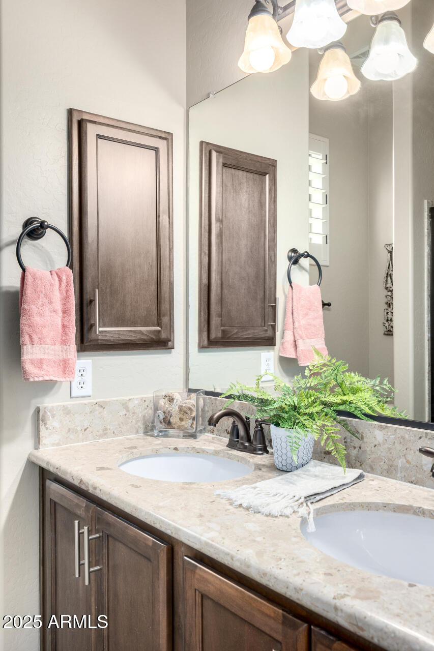 1822 North Waverly Mesa, AZ 85207 - Photo 52 of 91 a bathroom with a granite countertop sink and a mirror