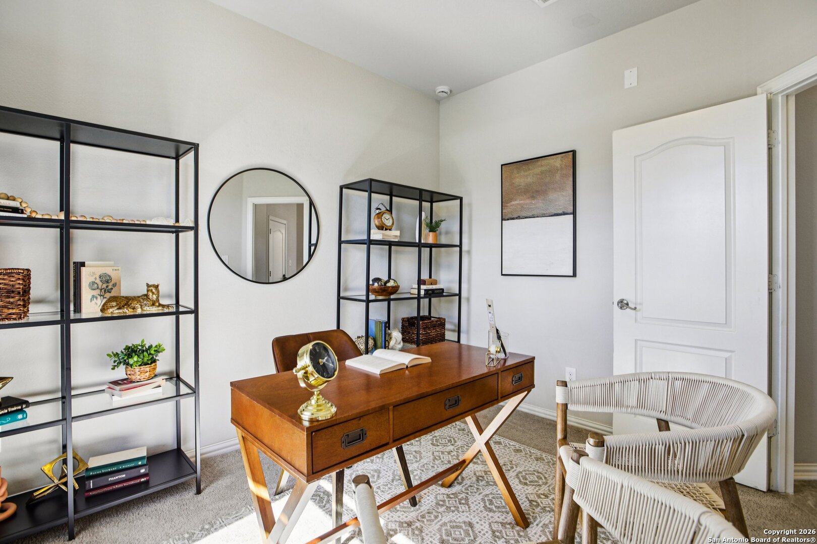 732 Bonnet Boulevard Georgetown, TX 78628 - Photo 14 of 55 a living room with a couch and a painting on the wall