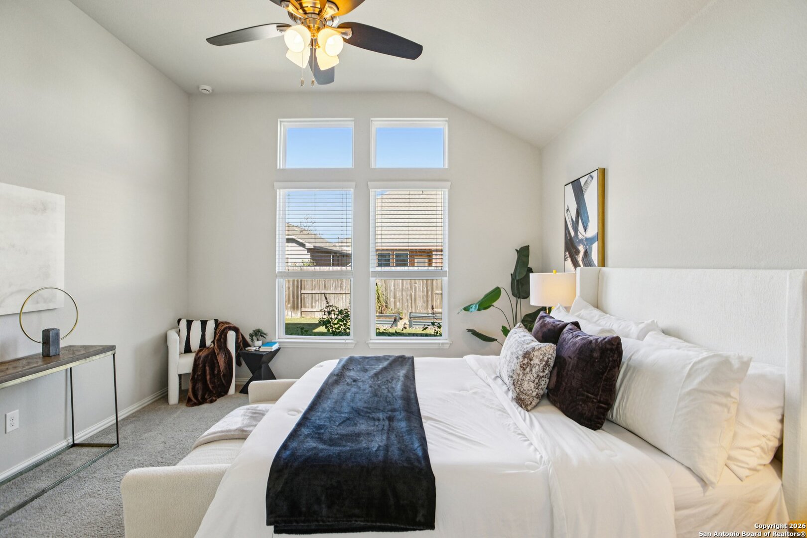 732 Bonnet Boulevard Georgetown, TX 78628 - Photo 18 of 55 a bedroom with a bed and a large window