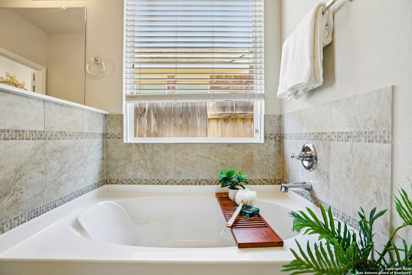 732 Bonnet Boulevard Georgetown, TX 78628 - Photo 21 of 55 a bath tub sitting in a bathroom next to a window