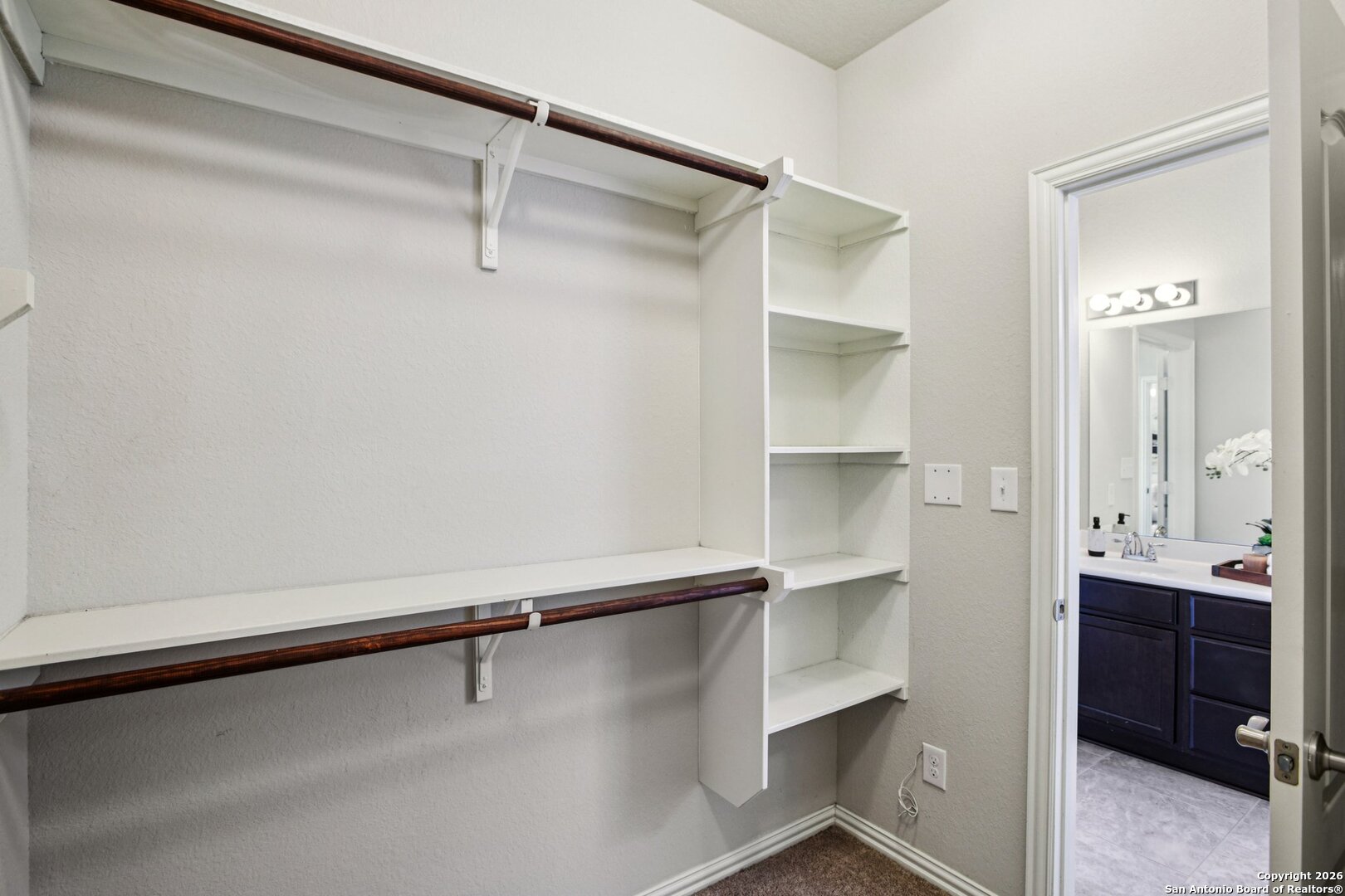 732 Bonnet Boulevard Georgetown, TX 78628 - Photo 24 of 55 a view of an empty walk in closet