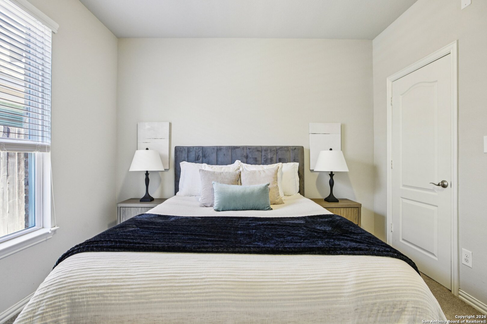 732 Bonnet Boulevard Georgetown, TX 78628 - Photo 26 of 55 a large bed in a white room