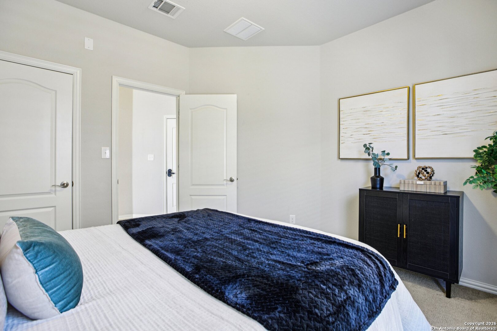 732 Bonnet Boulevard Georgetown, TX 78628 - Photo 27 of 55 a bedroom with a bed and a window