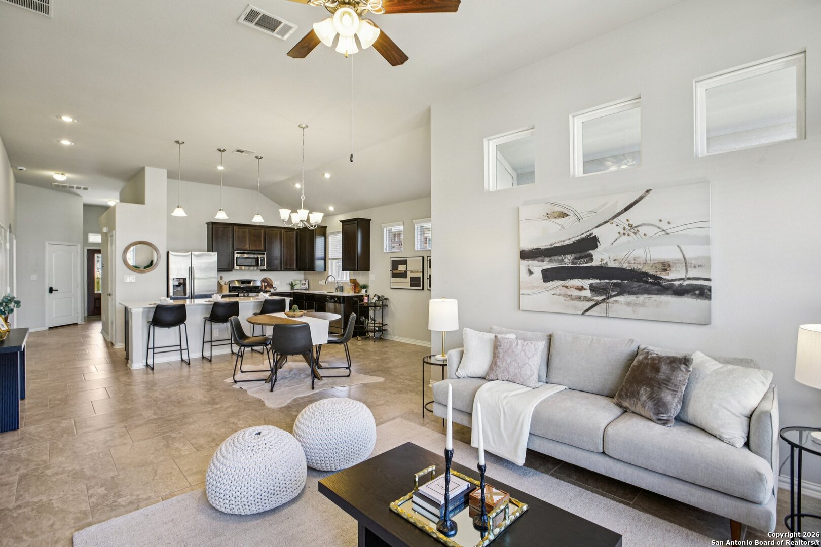 732 Bonnet Boulevard Georgetown, TX 78628 - Photo 4 of 55 a living room with furniture kitchen view and a chandelier