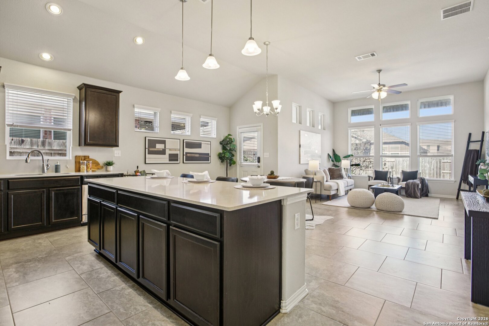 732 Bonnet Boulevard Georgetown, TX 78628 - Photo 5 of 55 a kitchen with a sink stove and cabinets