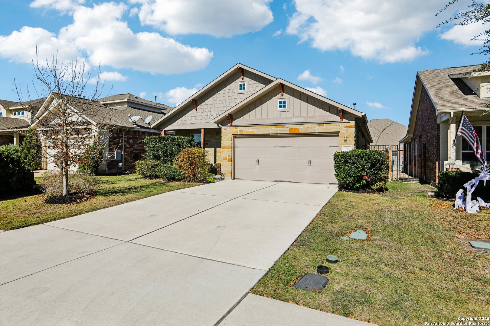 732 Bonnet Boulevard Georgetown, TX 78628 - Photo 55 of 55 a front view of a house with a yard and garage