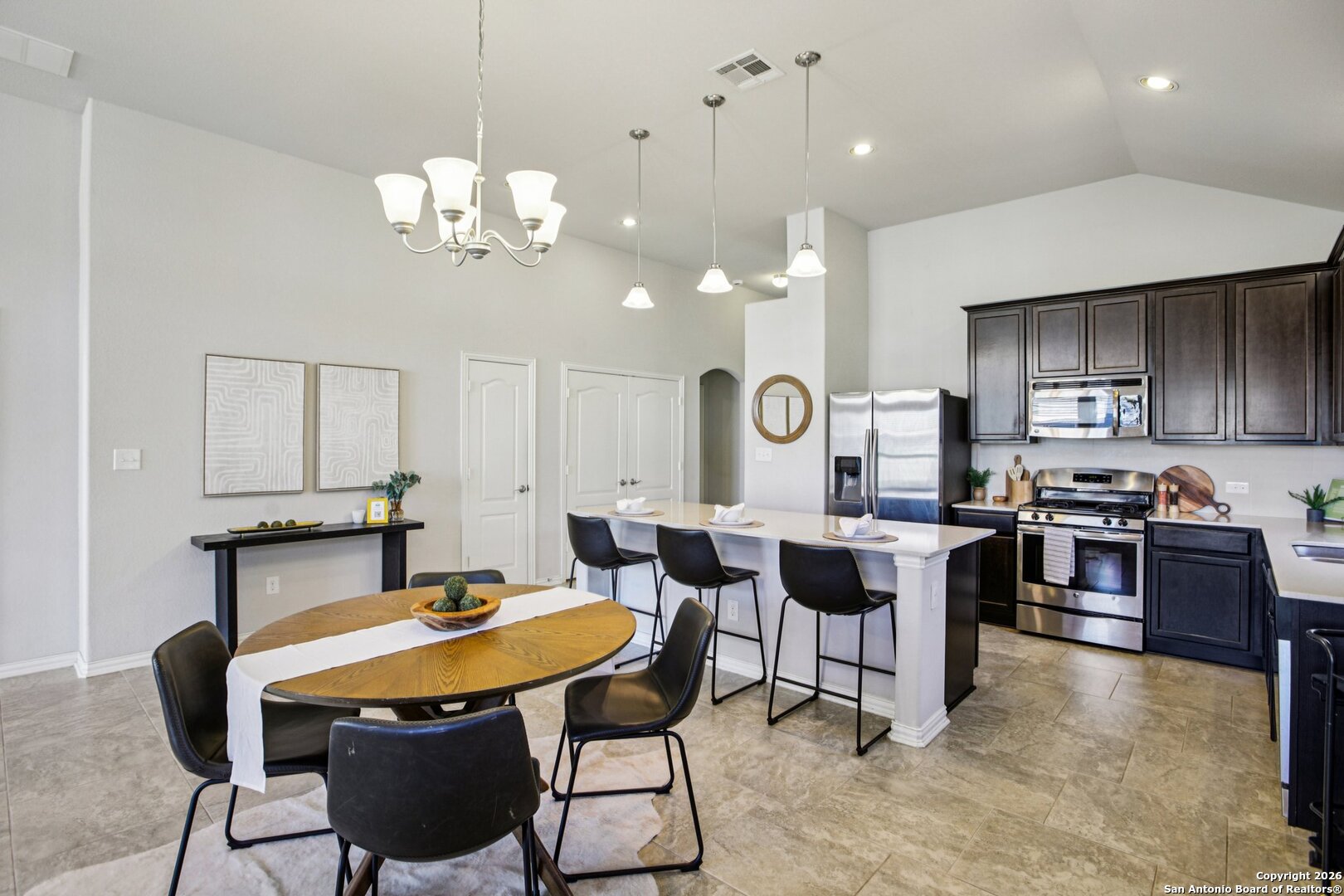 732 Bonnet Boulevard Georgetown, TX 78628 - Photo 9 of 55 a view of a dining room with furniture and wooden floor