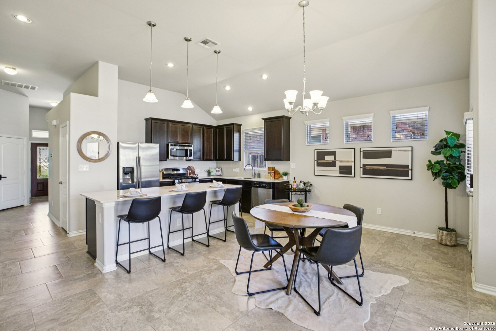 732 Bonnet Boulevard Georgetown, TX 78628 - Photo 10 of 55 a view of a dining room kitchen and a chandelier