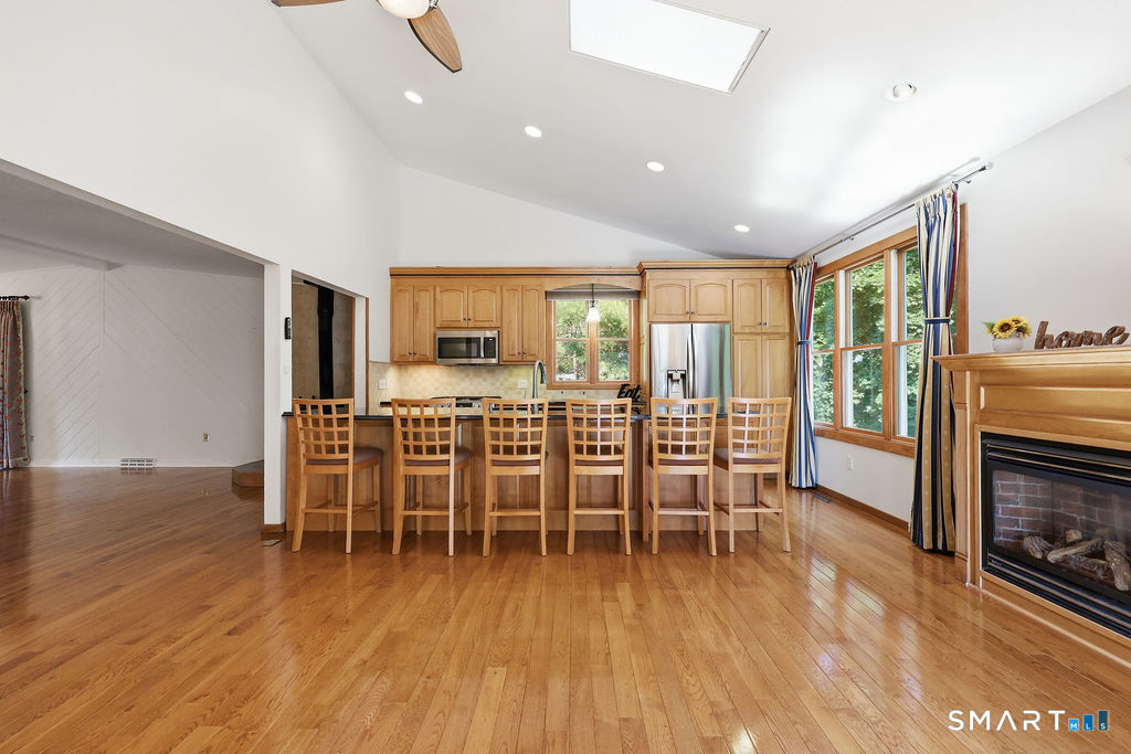 36 Banks Road Simsbury, CT 06092 - Photo 5 of 37 Remodeled kitchen has room for 6 chairs at the island.
