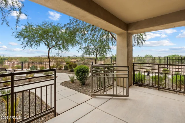 a view of a chairs and table on the terrace