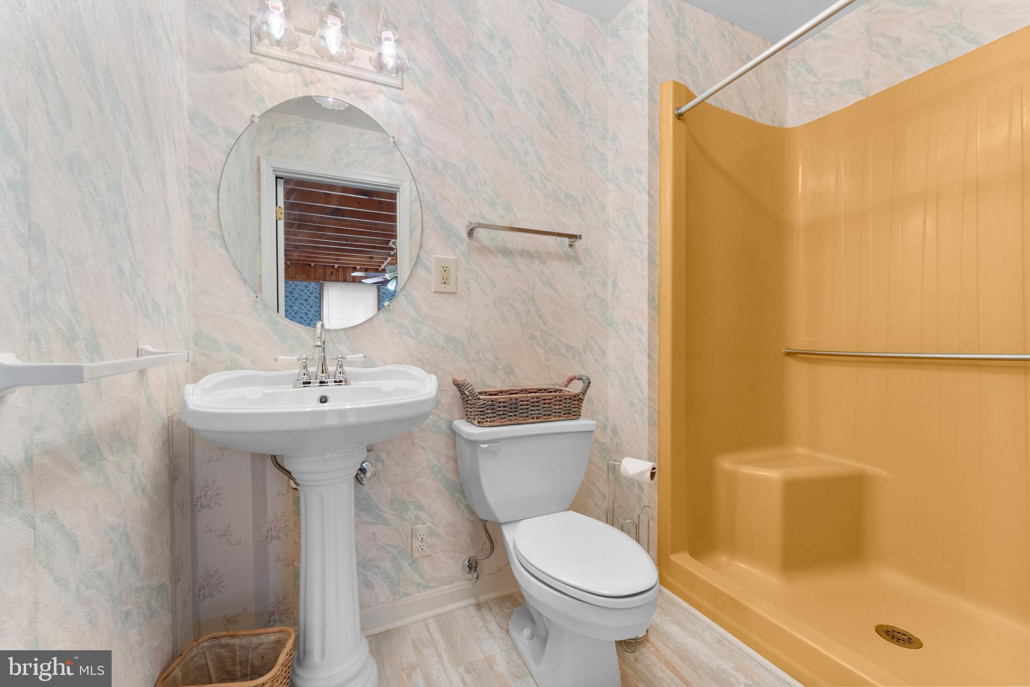 210 Elizabeth Street Culpeper, VA 22701 - Photo 23 of 48 a bathroom with a sink a toilet and shower