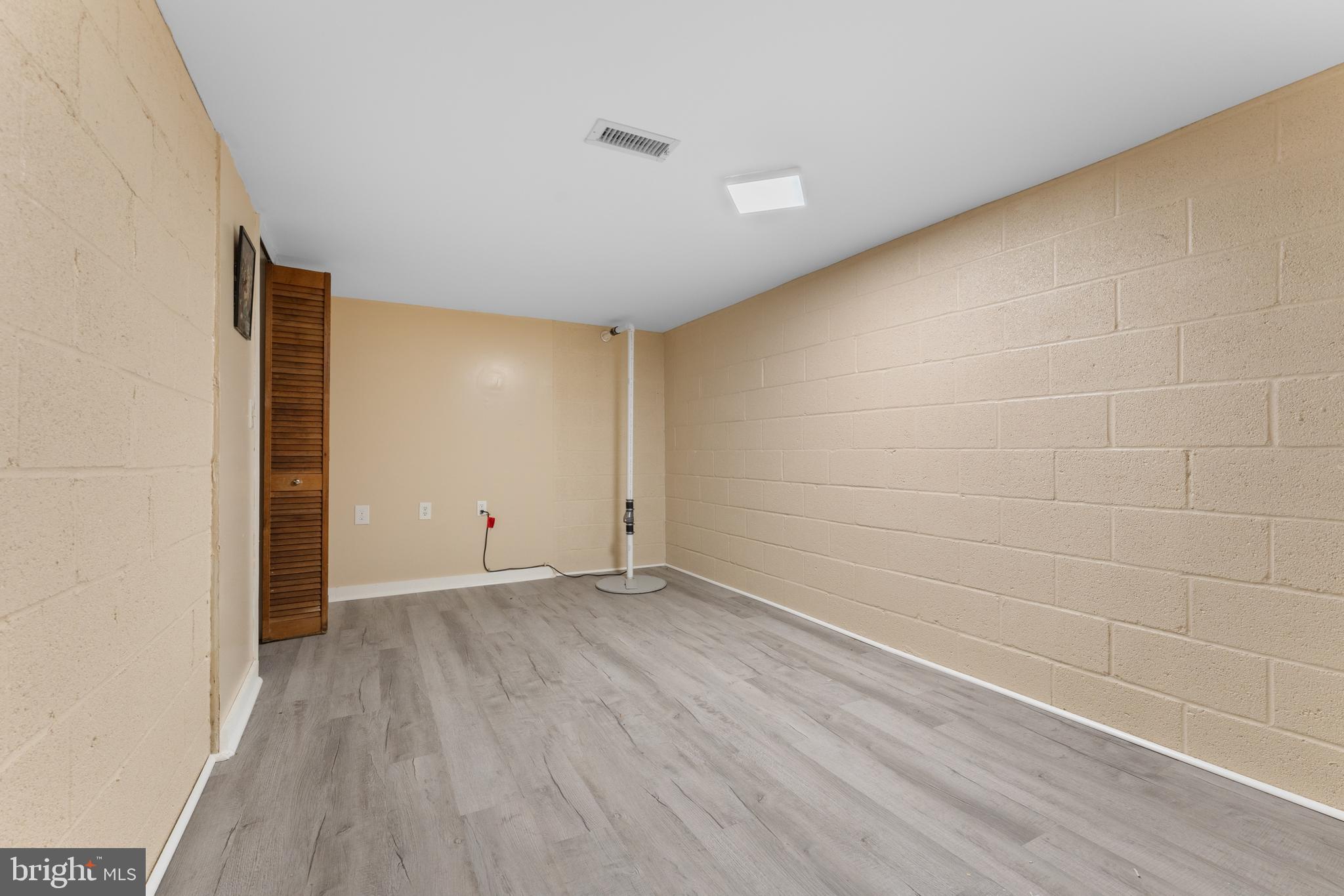 210 Elizabeth Street Culpeper, VA 22701 - Photo 32 of 48 a view of an empty room and wooden floor