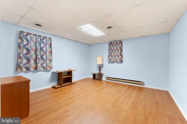 a view of room with hardwood floor