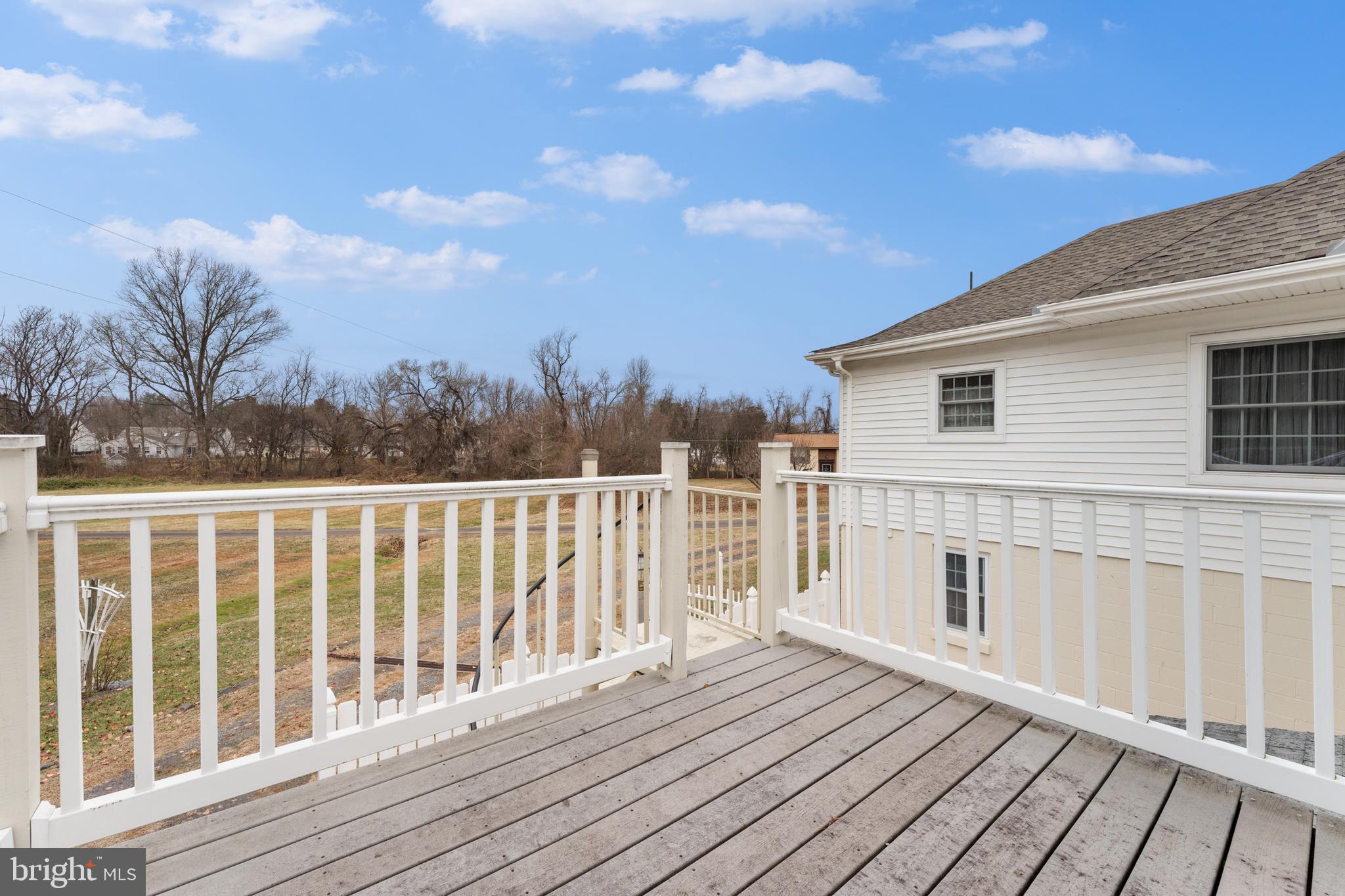 210 Elizabeth Street Culpeper, VA 22701 - Photo 39 of 48 a view of wooden deck and a yard