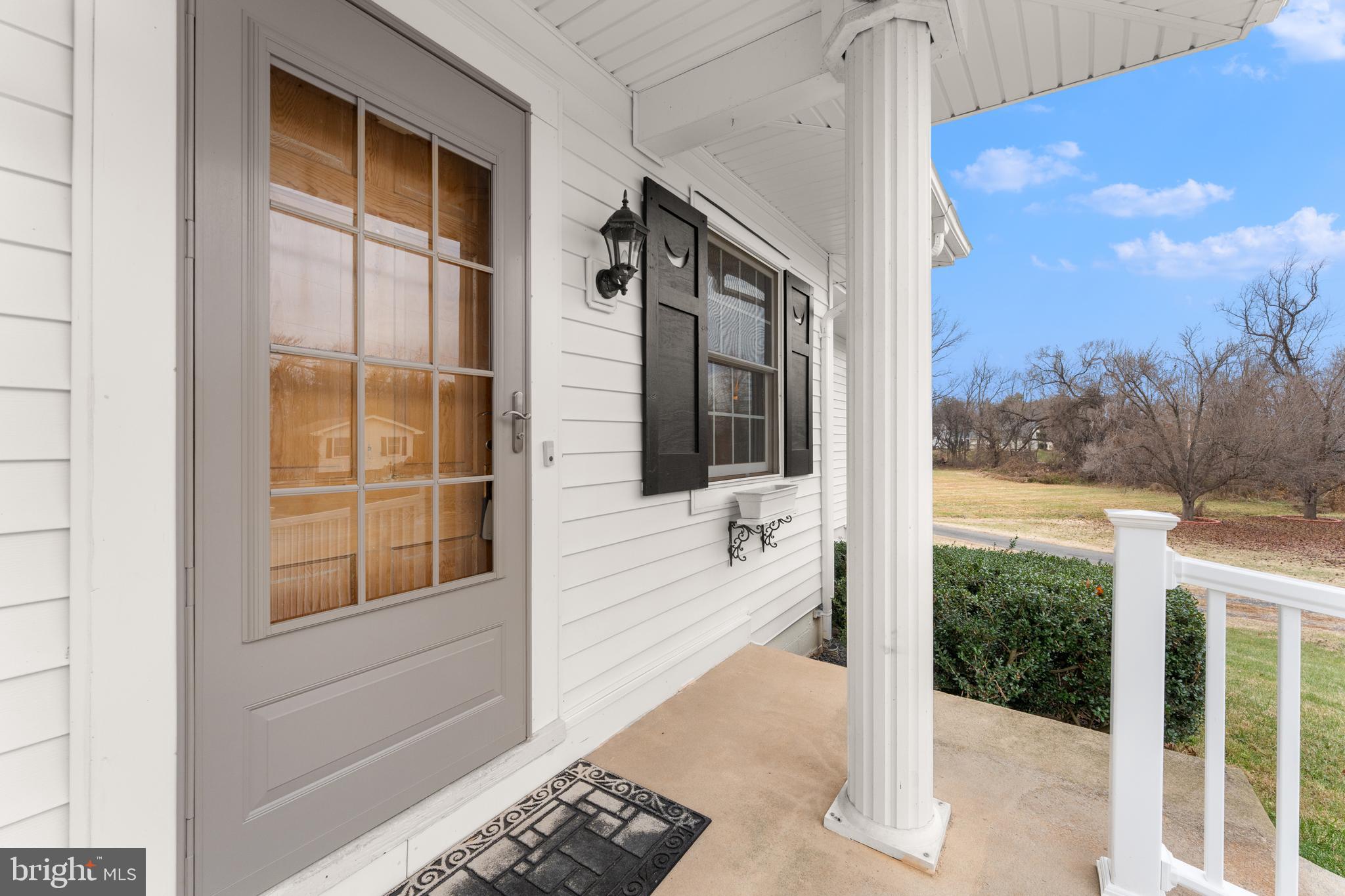 210 Elizabeth Street Culpeper, VA 22701 - Photo 5 of 48 a porch with a door and balcony