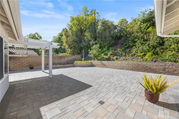 a view of a backyard with a garden