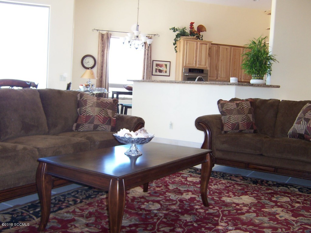 530 Ruth Lane Rio Rico, AZ 85648 - Photo 23 of 36 a living room with furniture and wooden floor