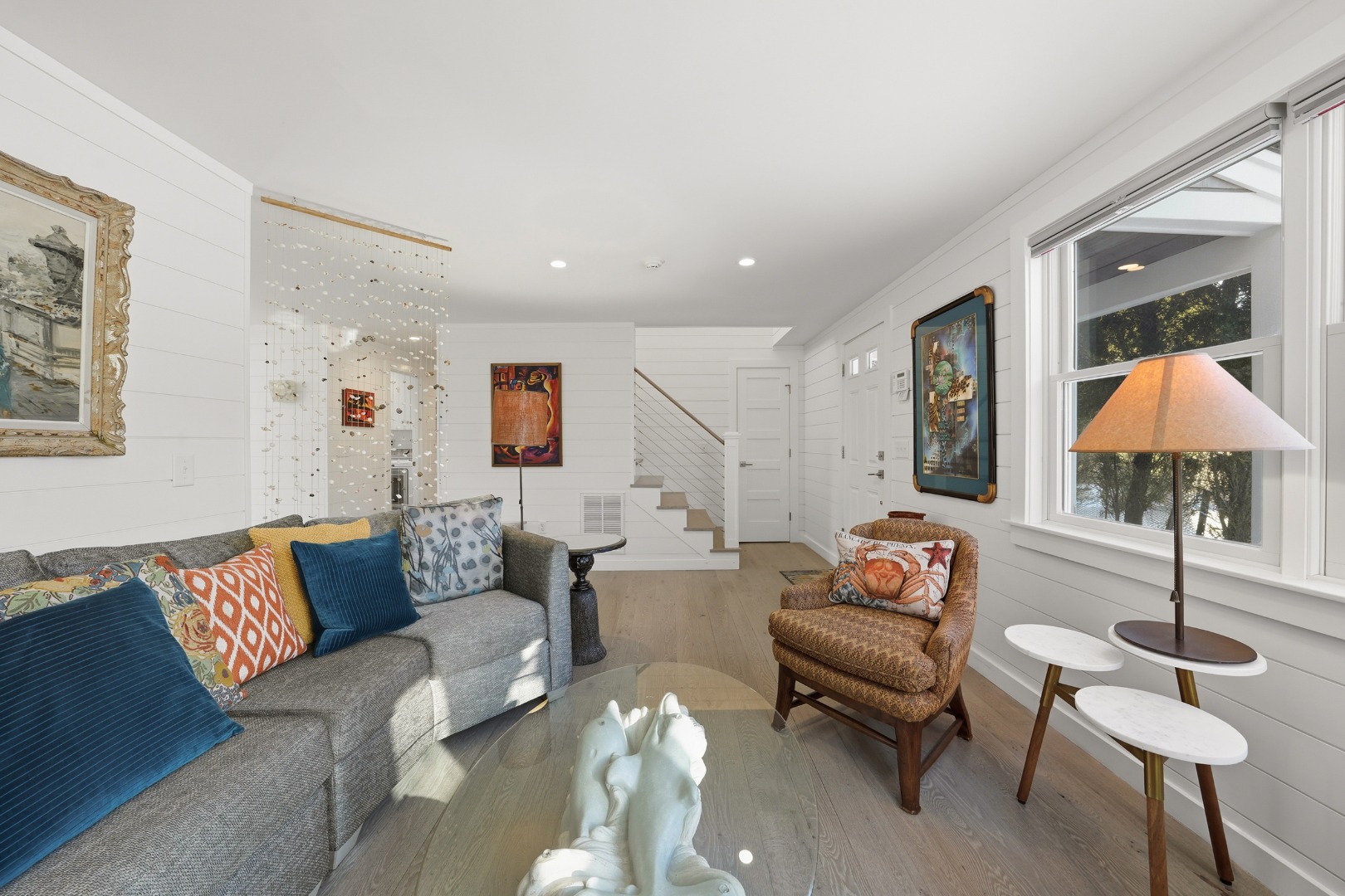 10 Pilgrim Road Nantucket, MA 02554 - Photo 11 of 65 a living room with furniture and a lamp