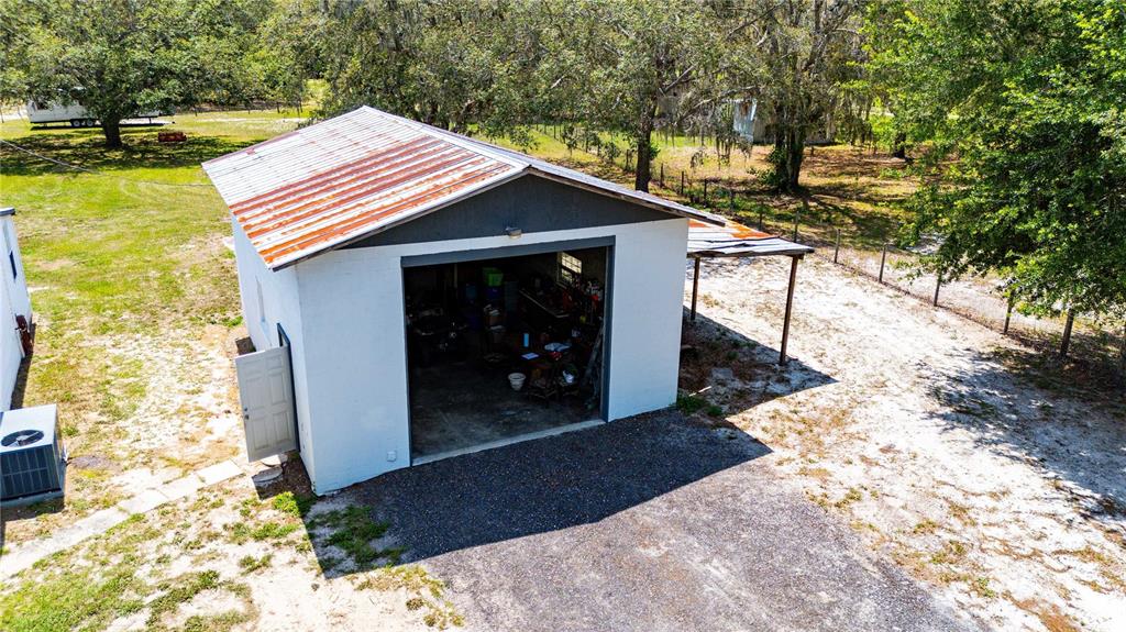 4131 Burwell Road Webster, FL 33597 - Photo 53 of 61 a view of a house with a yard