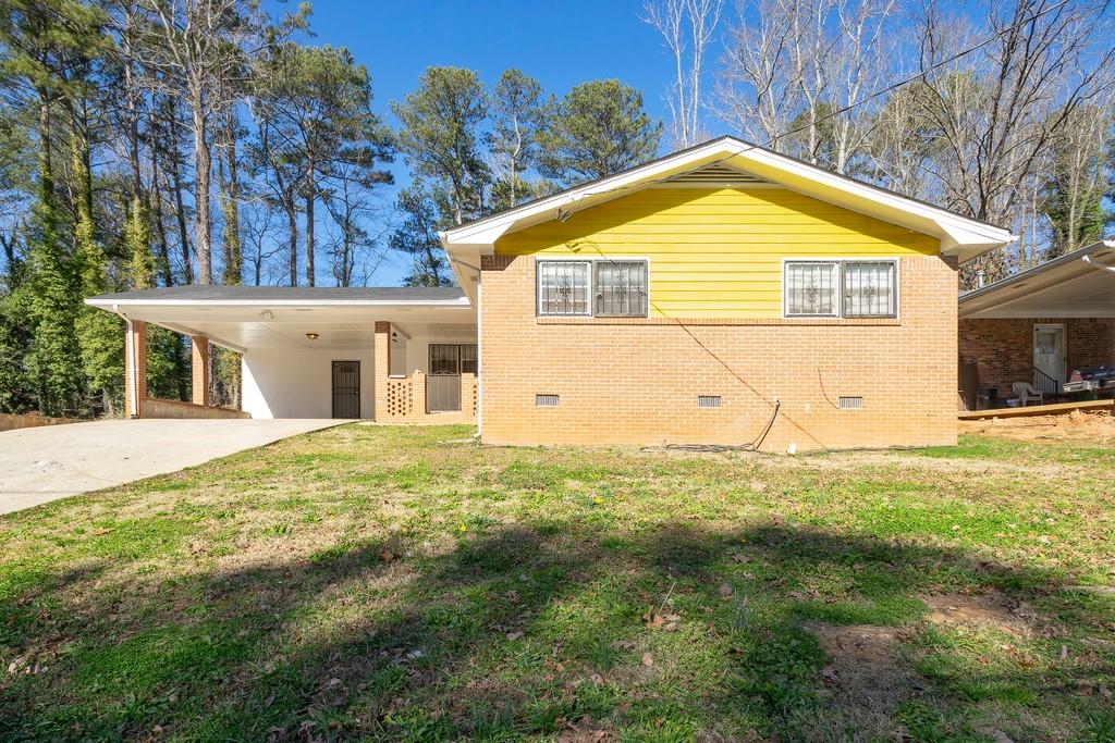 4000 Maplewood Drive Decatur, GA 30035 - Photo 1 of 1 a view of a house with backyard