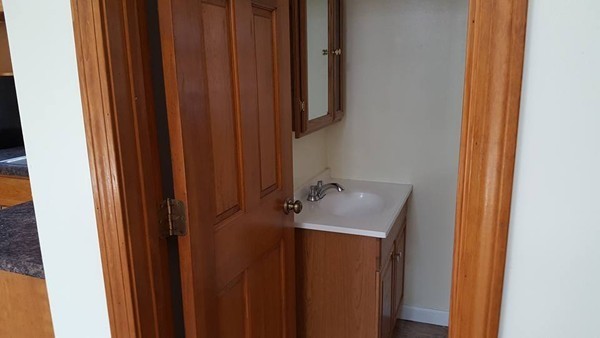 39 Ridge Way Sturbridge, MA 01566 - Photo 19 of 23 a bathroom with a sink and mirror