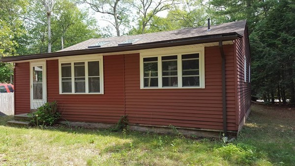 39 Ridge Way Sturbridge, MA 01566 - Photo 4 of 23 a view of a house with a yard plants and large tree