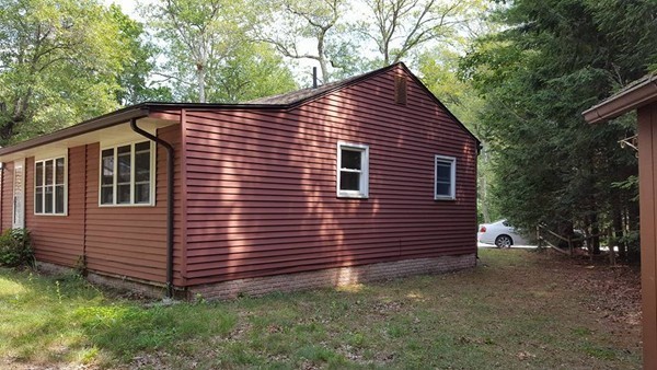 39 Ridge Way Sturbridge, MA 01566 - Photo 6 of 23 a front view of a house with a yard