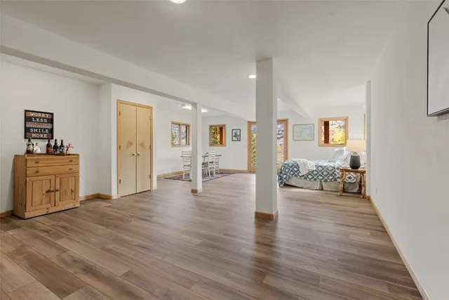 a view of a livingroom with wooden floor