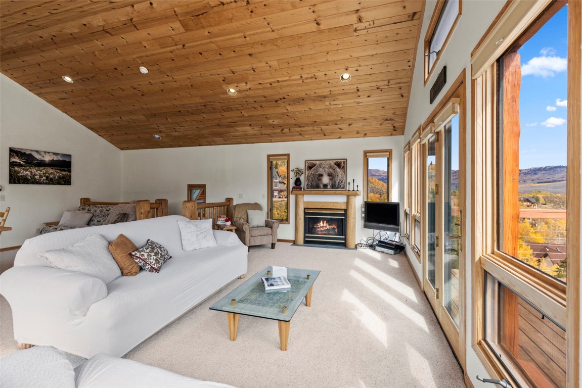 1007 Blue Ridge Road Silverthorne, CO 80498 - Photo 28 of 50 a living room with furniture and a large window