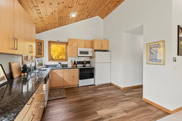 a view of a living room and entry way