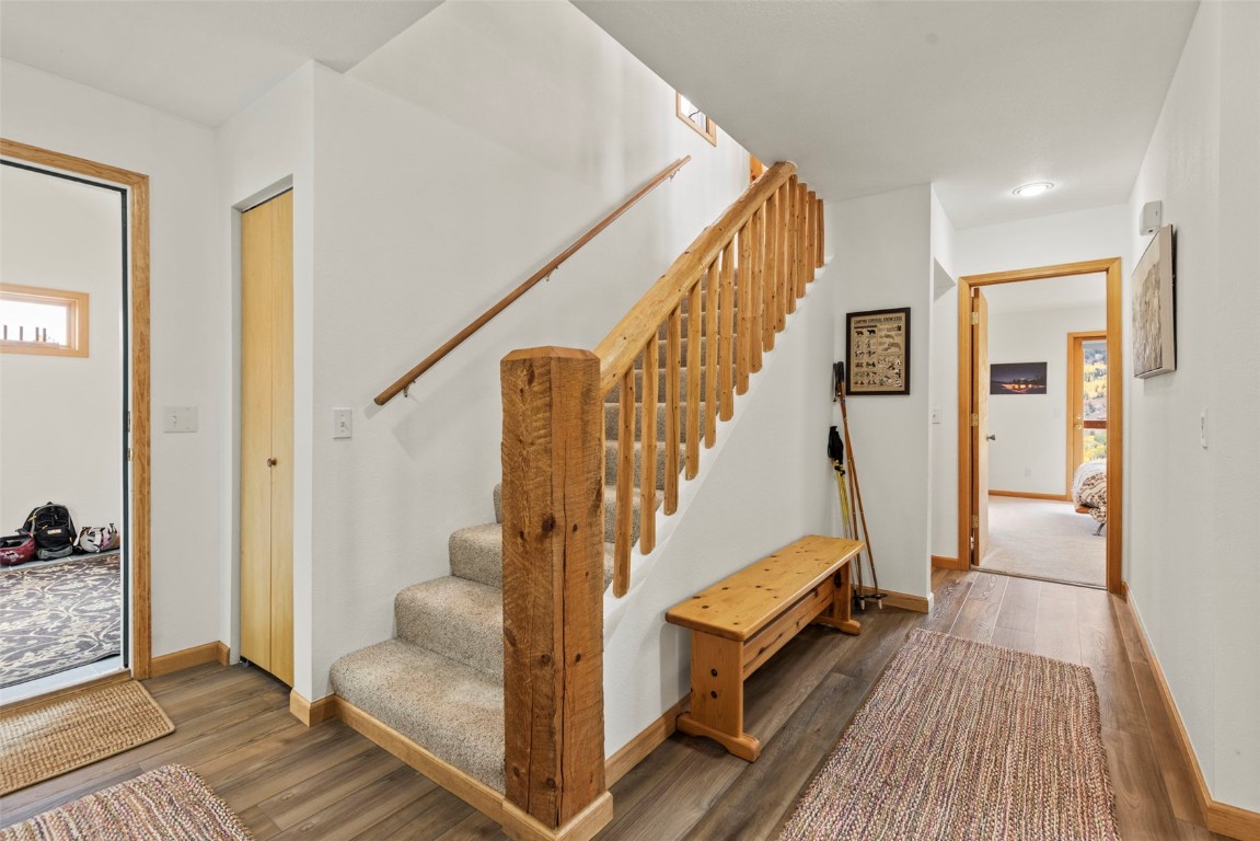 1007 Blue Ridge Road Silverthorne, CO 80498 - Photo 41 of 50 a view of entryway and hall with wooden floor