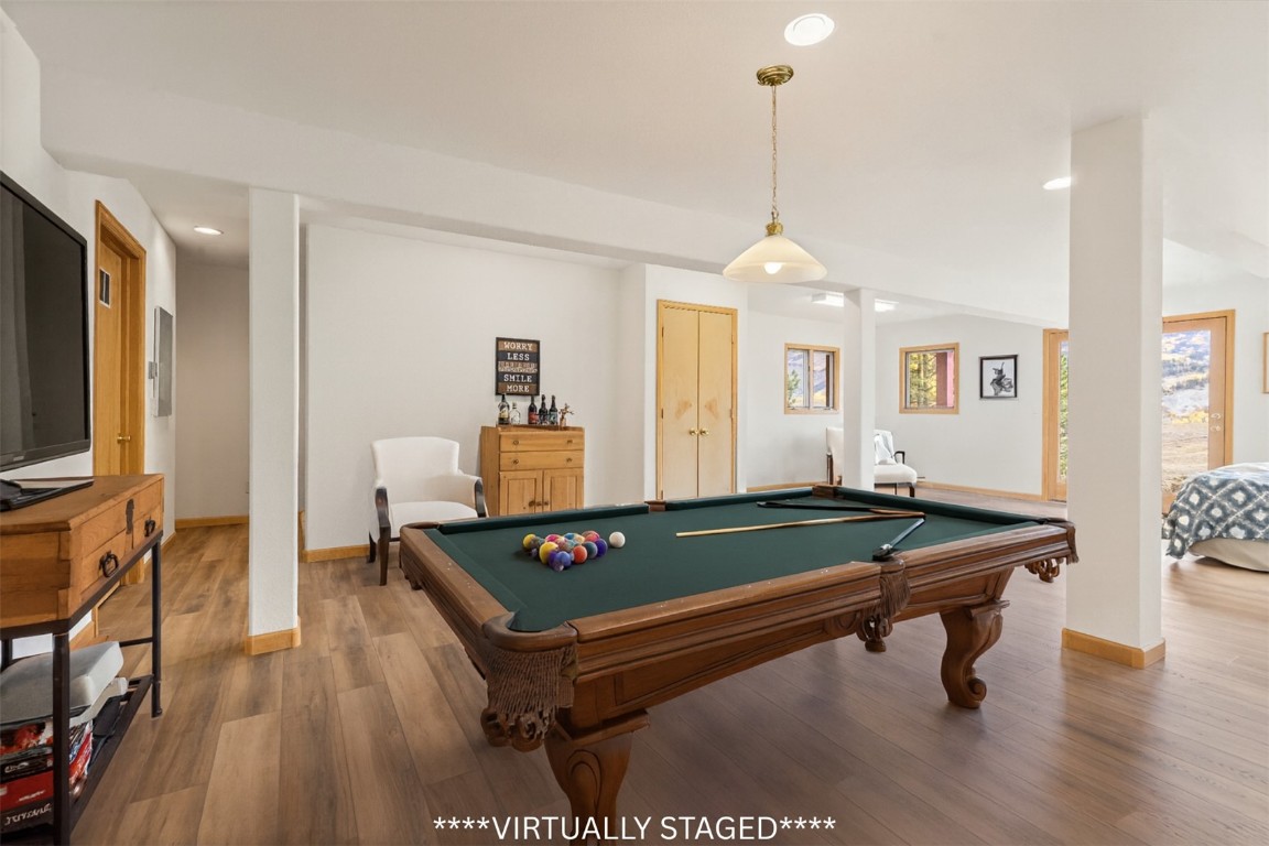 1007 Blue Ridge Road Silverthorne, CO 80498 - Photo 45 of 50 a room with pool table and windows