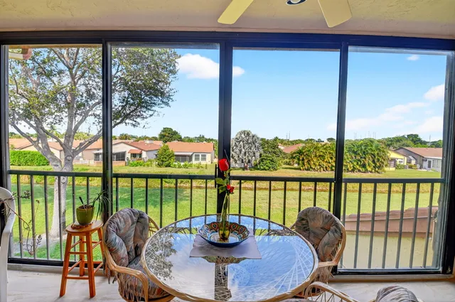 a view of swimming pool with a yard