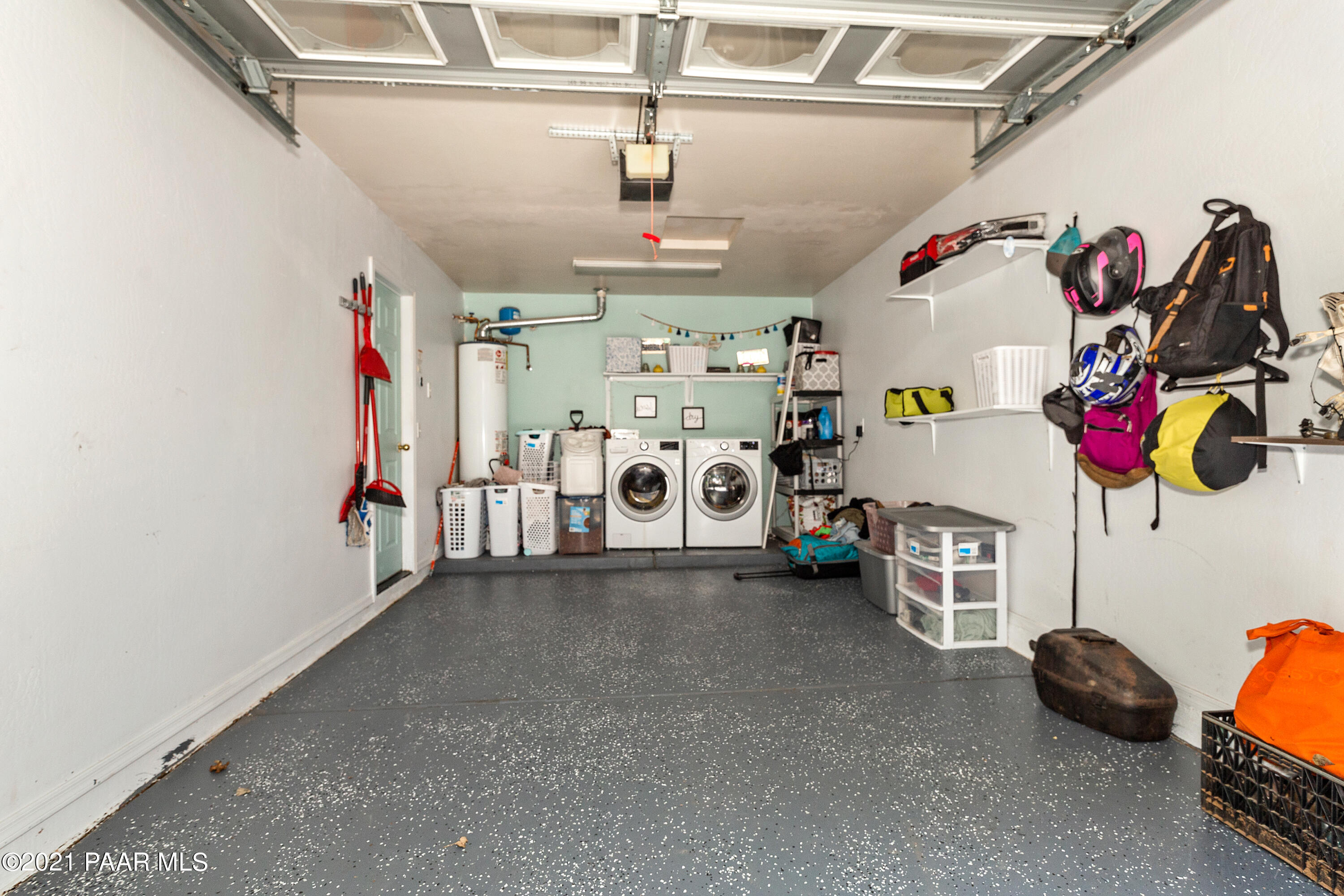 741 Gail Gardner Way, Unit I Prescott, AZ 86305 - Photo 13 of 16 a view of storage and utility room with toys and a fan
