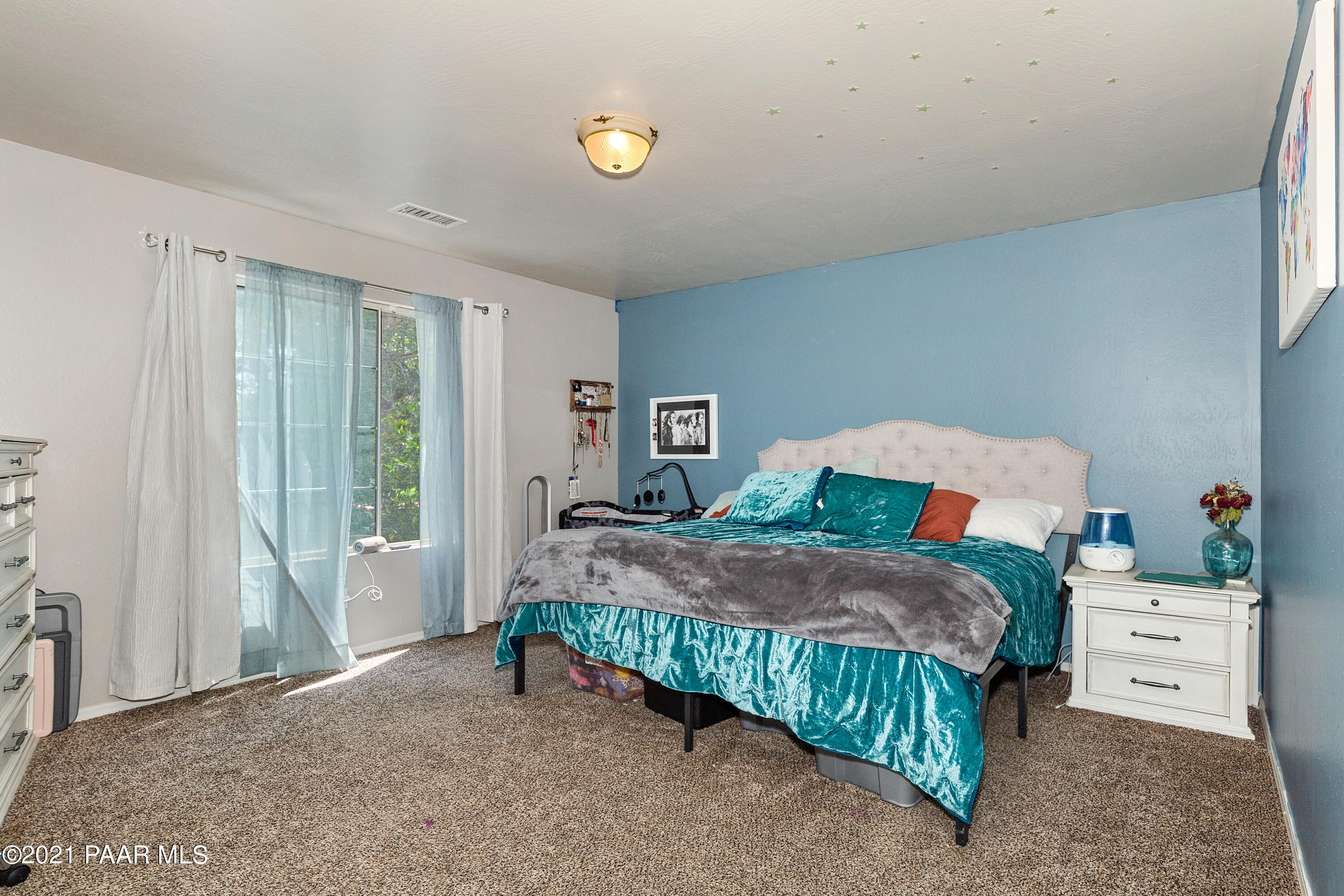 741 Gail Gardner Way, Unit I Prescott, AZ 86305 - Photo 6 of 16 a bedroom with a bed and a window